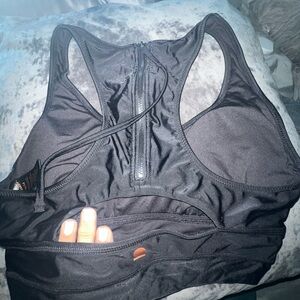Sleek Black Swim top spf 50 $10 M NWT
with Zipper